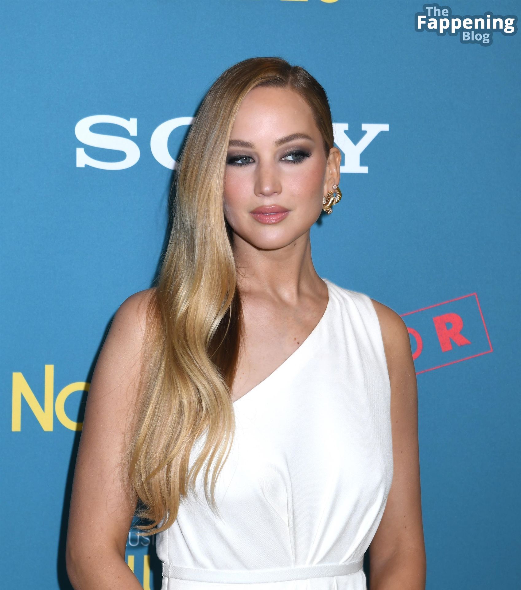 Jennifer Lawrence Looks Stunning in a White Dress at the ‘No Hard ...